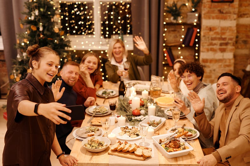 Woman taking picture of people at a festive party.