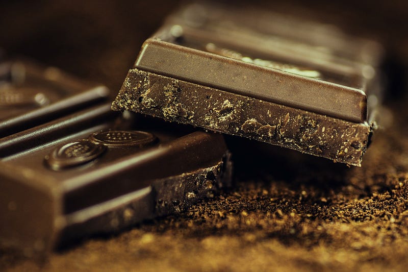 Two bars of rich chocolate.