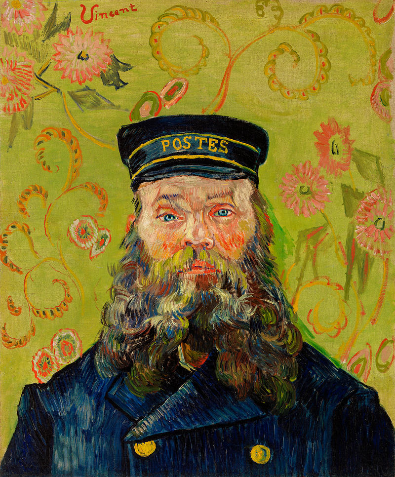 Portrait of a postman in blue uniform with large beard.